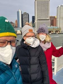 A group of people posing for the camera Description automatically generated with medium confidence